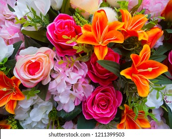 Beautiful multicolored  artificial flowers background