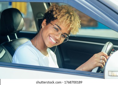 Beautiful Multiracial Young African American Girl Driving First Car