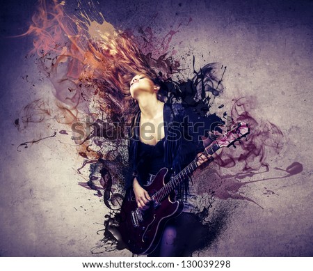 beautiful musician playing guitar