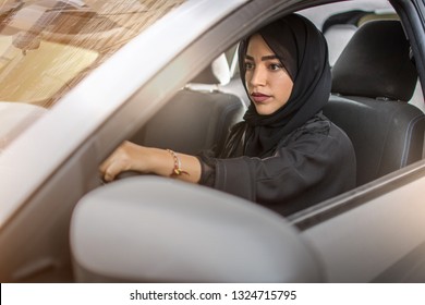 Beautiful Muslim Woman Driving Car