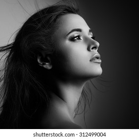 Beautiful Mystic Woman Profile With Long Hair Looking. Black And White Portrait. CLoseup