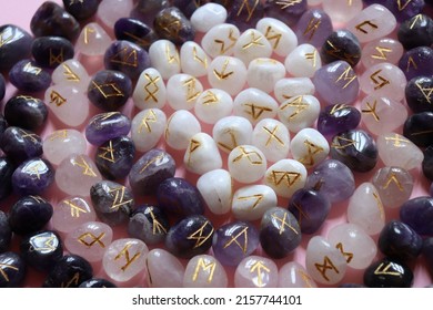 Beautiful and mystical rune stones made of white agate, amethyst and rose quartz 