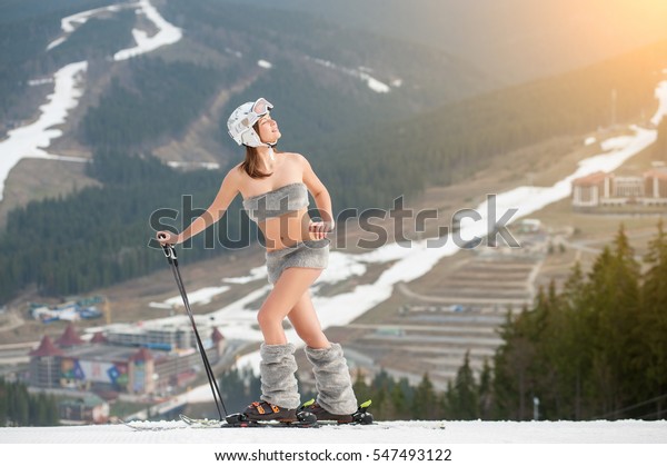 Beautiful Naked Woman Skier Enjoying Spring Stock Photo