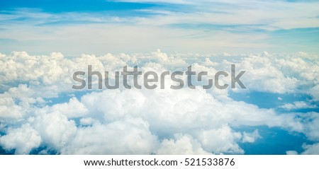Beautiful natural cloudscape and sky Aerial view of Blue sky and top Cloud view or cloudy of bird eye view from airplane window.