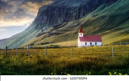 Beautiful natural landscape at sunset. Dramatic evening scenery of Iceland. Amazing small church in mountains valley with colorful sky. Iceland the country of the best Incredible nature locations. - Powered by Shutterstock