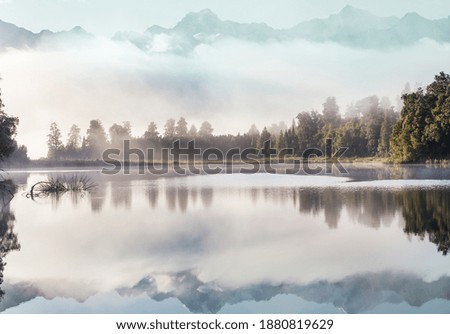 Similar – Foto Bild Nebliger Wald mit einem Licht in der Ferne, Zermatt, Schweiz