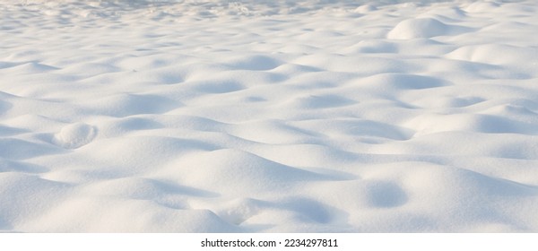 Beautiful natural Snowdrift in sunny day. Nature Winter snow background, selective focus. Winter snowy Texture With Copy Space for design