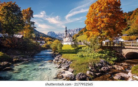 Beautiful nature landscape. Incredible autumn scenery. Scenic mountain landscape in the Bavarian Alps. Small church on the river bank.view on famous Parish Church of St. Sebastian - Powered by Shutterstock