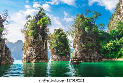 Beautiful Nature Scenic Landscape View Rock Mountain Khao Sok National Park With Boat For Travelers, Attractive Famous Popular Place In Thailand, Destinations Scenery Asia, Water Travel Adventure Trip