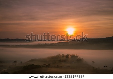 Beautiful nature sunrise Mountain Morning view point, Sun rises, at khao kho Thailand. 