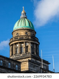 The beautiful neoclassical dome of West Register House in the city of Edinburgh, Scotland.  The building is home to the National Records of Scotland.