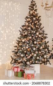 Beautiful New Year's interior, Christmas tree, gifts - Shutterstock ID 2068878302