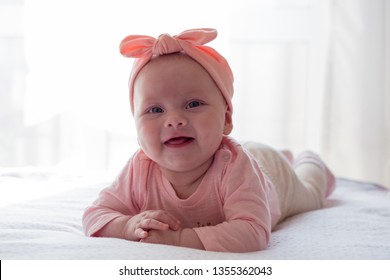 Beautiful Newborn Baby Girl With Pink Headband