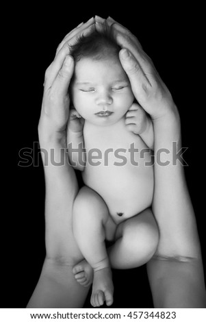 Newborn sleeping lying on blanket