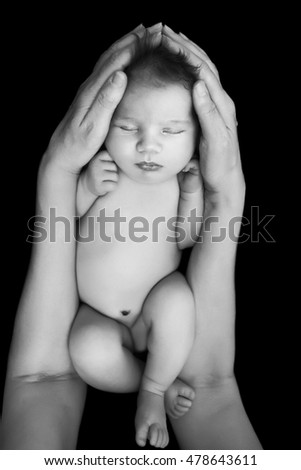 Similar – Newborn sleeping lying on blanket