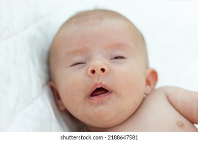 A Beautiful Newborn Baby Sneezing