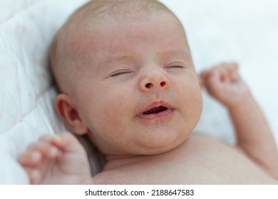 A Beautiful Newborn Baby Sneezing