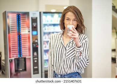 A Beautiful News Anchor Drinks Coffee