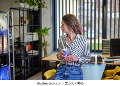 Beautiful News Anchor Enjoys Coffee