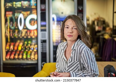 Beautiful News Anchor Enjoys Coffee