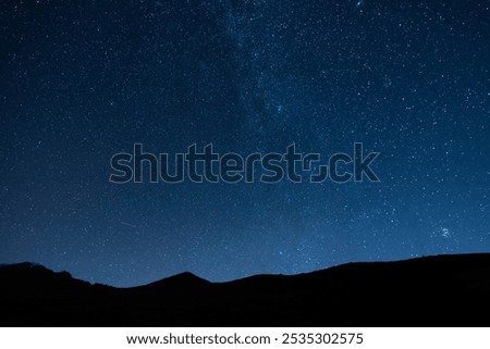 Similar – Image, Stock Photo Night. Night photography where the stars are seen in the sky with silhouettes of trees and colors of the sunset. Photography.