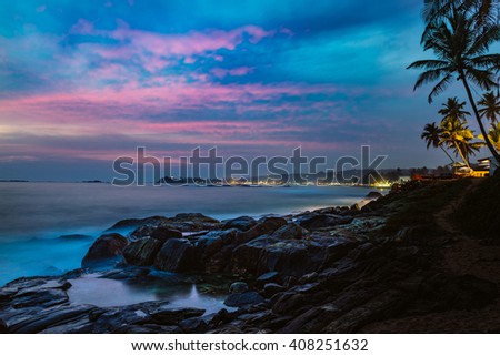 Beautiful night landscape tropical rocky beach. Sri Lanka.