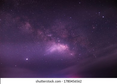 Beautiful night view of sky with Milkyway Galactic Center, Jupiter and Saturn shining brightly. Beautiful view of night sky with full of stars and clouds.