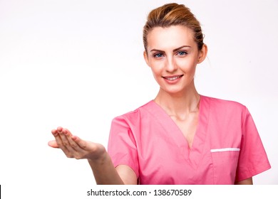 Beautiful Nurse With Extended Arm Holding Sign