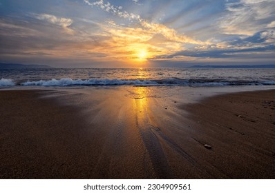 A Beautiful Ocean Sunset With A Wave Breaking On Shore High Resolution - Shutterstock ID 2304909561