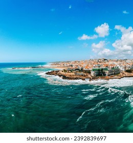 Beautiful oceanscape with skyline, ocean rocky coastline. Drone view over beaches, coastlines in Ericeira, Portugal, on summer sunny day. Aerial view to the Beautiful European touristic town.
