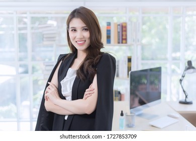 Beautiful Office Lady Standing And Smiling At Work Happily. Work From Home