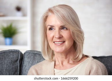 Beautiful Old Blonde Woman Is Smiling At Home