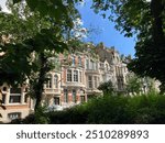 Beautiful old building facades in the green streets of Ixelles, Brussels, Belgium