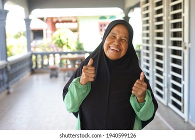 Beautiful Old Muslim Malay Woman Feeling Happy And Good