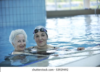 Beautiful Old Senior  Woman Have Fun And Recreation On Swimming Pool