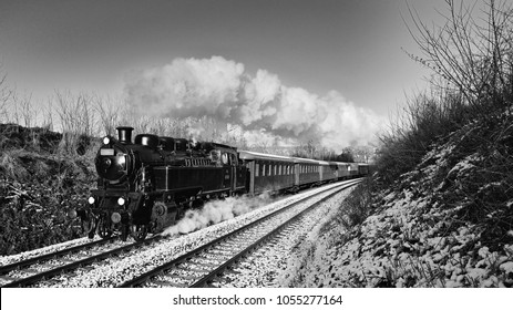 Beautiful old steam train with wagons running on rails at sunset. Excursions for children and parents on festive special days. Czech Republic Europe.
Black and white photography. - Powered by Shutterstock