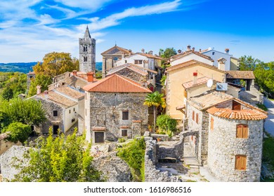 Beautiful old town of Hum, stone houses and church tower bell, romantic traditional architecture in Istria, Croatia, aerial view from drone