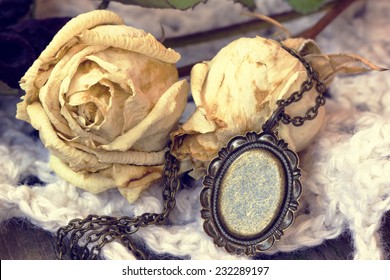 beautiful old vintage locket and roses