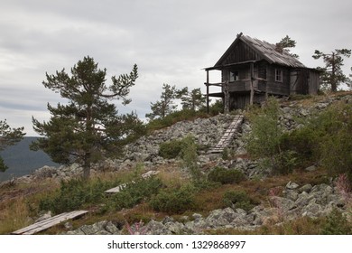 Beautiful old wooden cottage on the top of Levitunturi fell on autumn. This cabin is near of ski slopes and it is very popular place for tourist to take photos