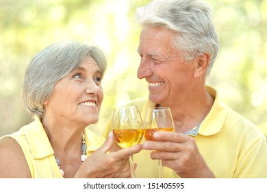 Beautiful Older Couple Drinking Wine