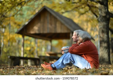 Beautiful Older Couple Walking In The Fresh Air