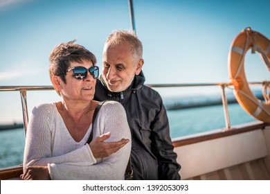 Beautiful Older Senior Couple In Love. Senior Man And Woman Enjoying Vacation On Boat Traveling