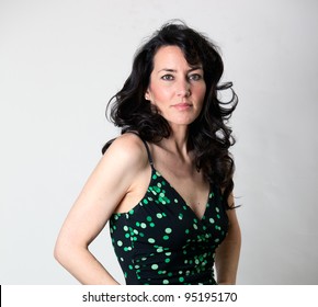 A Beautiful Older Woman In A Polka-dot Summer Dress