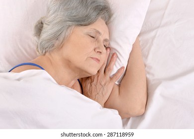 Beautiful Older Woman Sleeping In The Bedroom