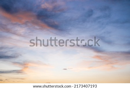 Beautiful orange clouds and sunlight on the blue sky, perfect sky for the background, take in morning on rainy season,Twilight