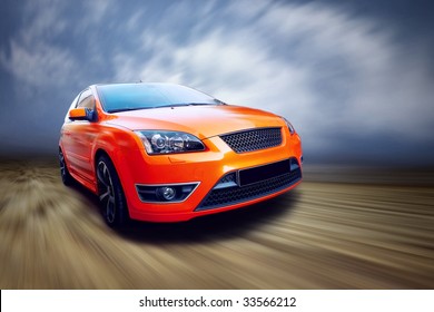 Beautiful Orange Sport Car On Road