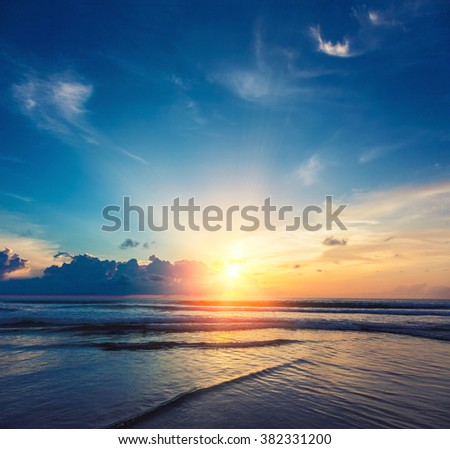 Beautiful orange sun rise with sea and clouds