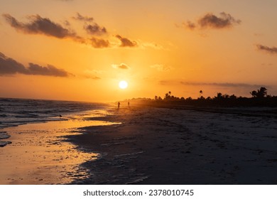 A beautiful orange sunrise at the beach in Mexico
