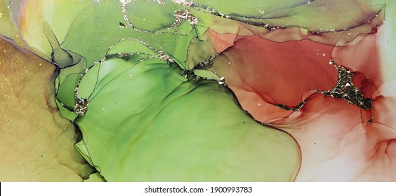 Beautiful organic liquid ink flows. Abstract alcohol ink in layers of swirls and gold leaf. Colors mixing in blended flows. Natural green and brown flowing together in harmony. - Shutterstock ID 1900993783