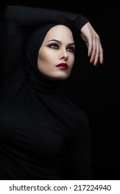 beautiful oriental girl dressed in black